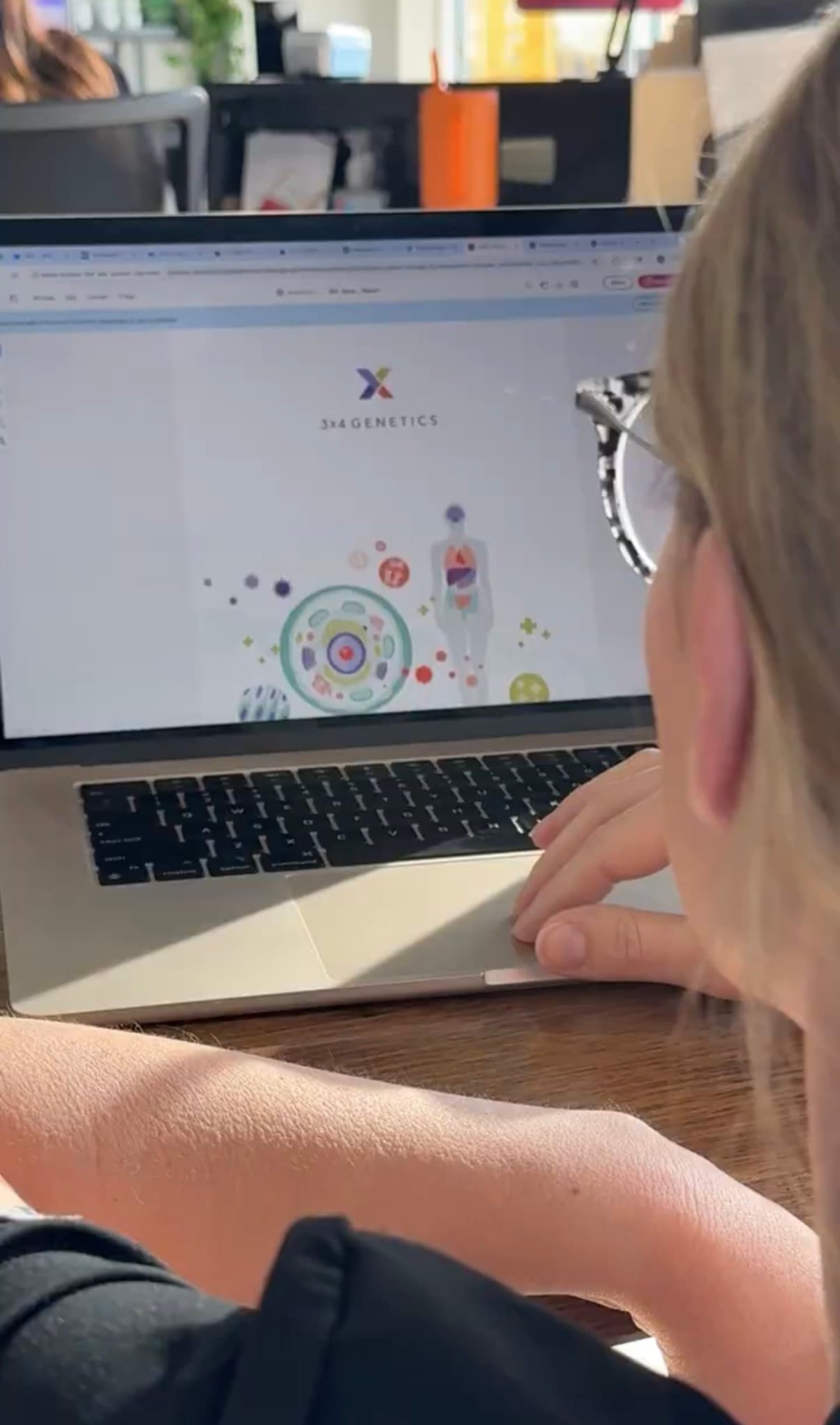 Gen 3 team member reviewing genetics information on a laptop
