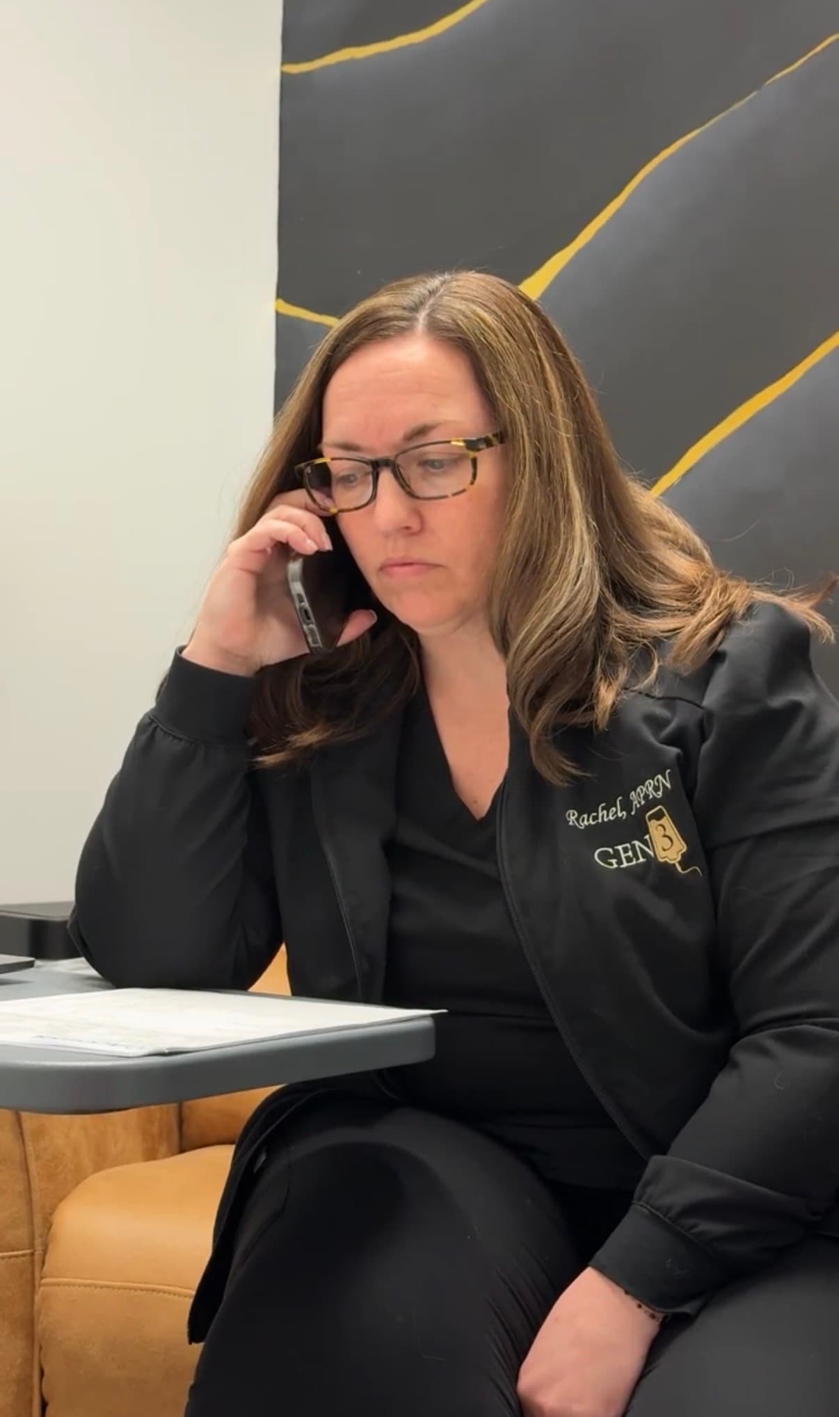 Rachel from the Gen 3 team talking with a patient by phone