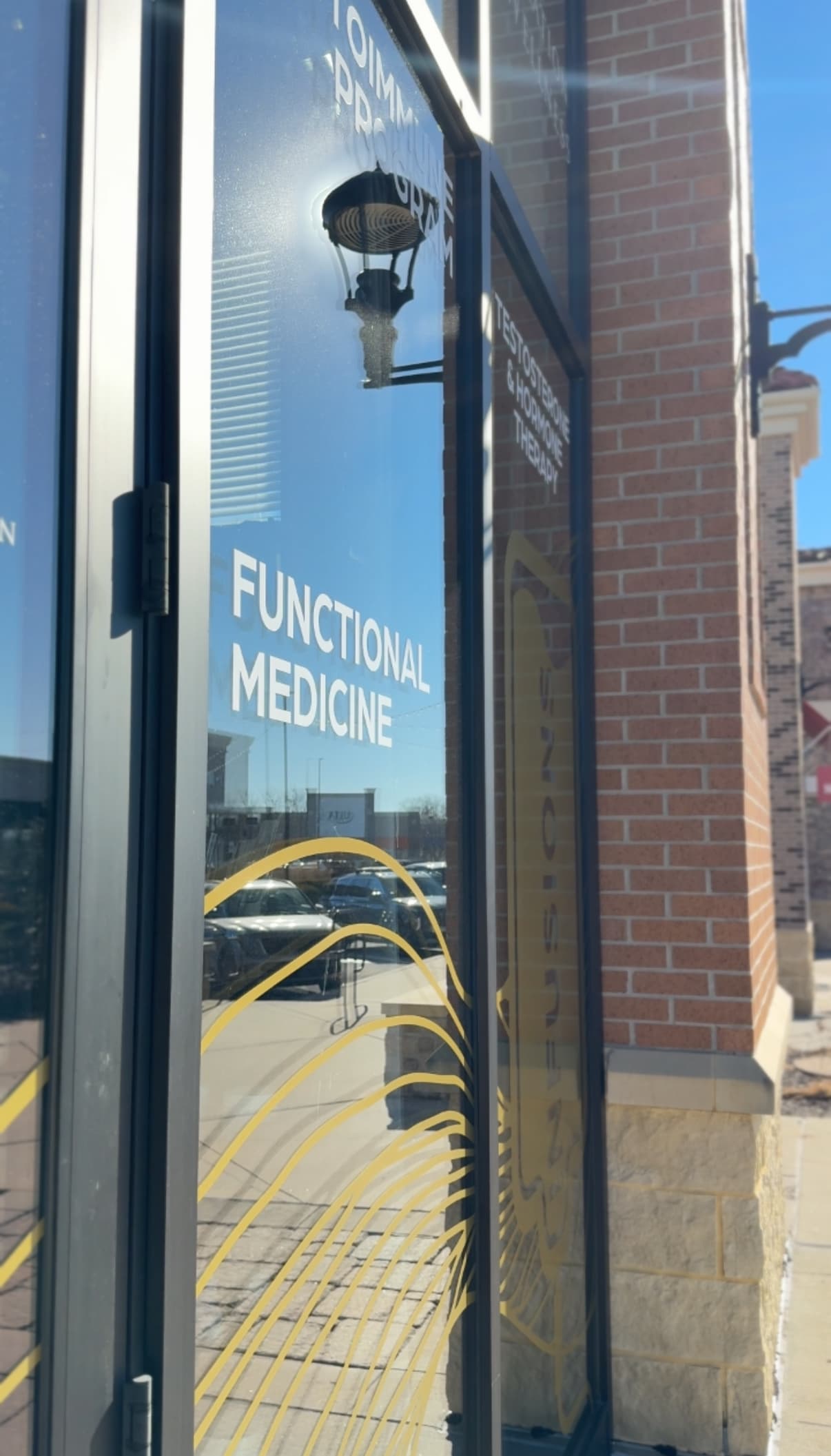 Gen 3 storefront window with functional medicine lettering