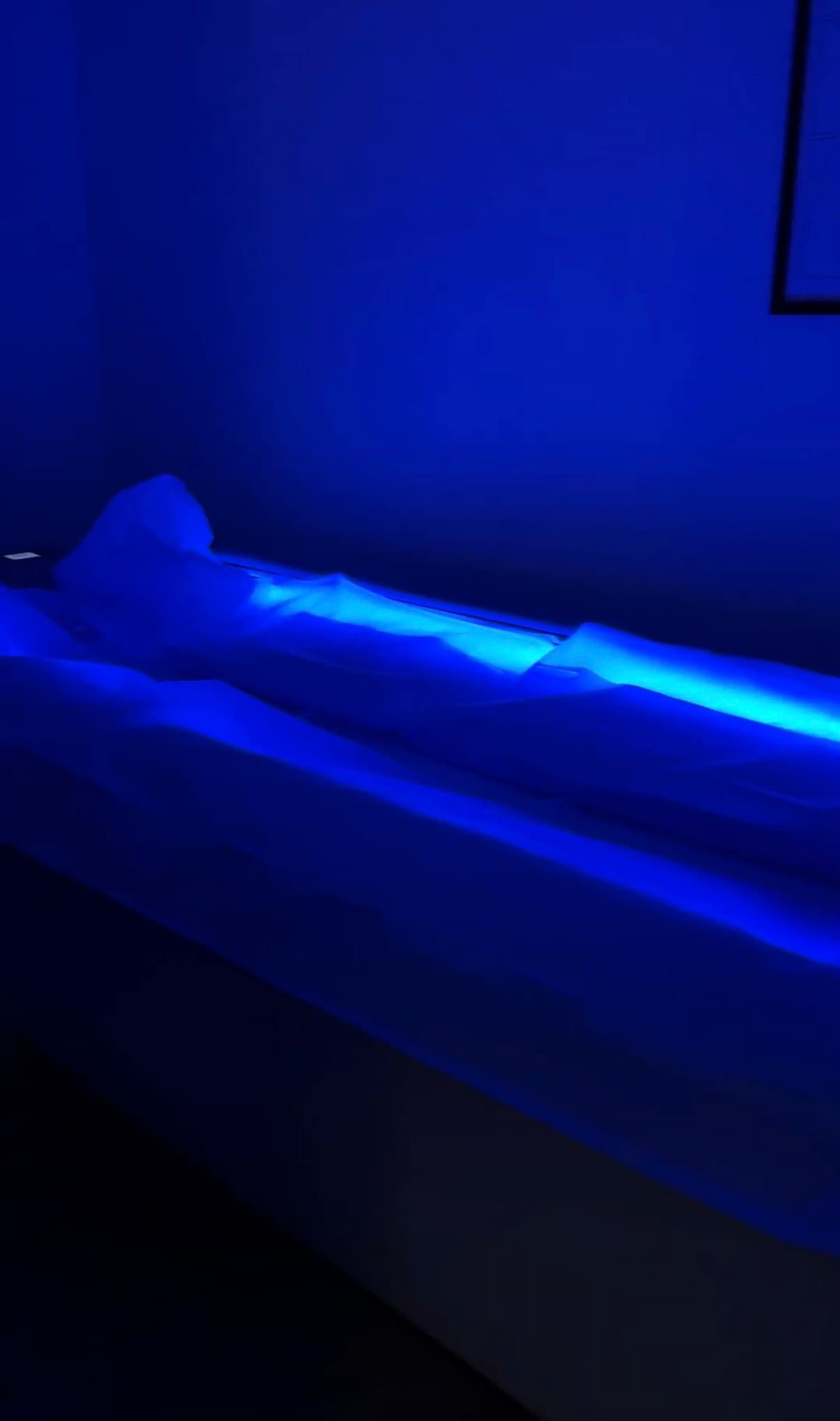 Dry cold plunge bed lit in blue