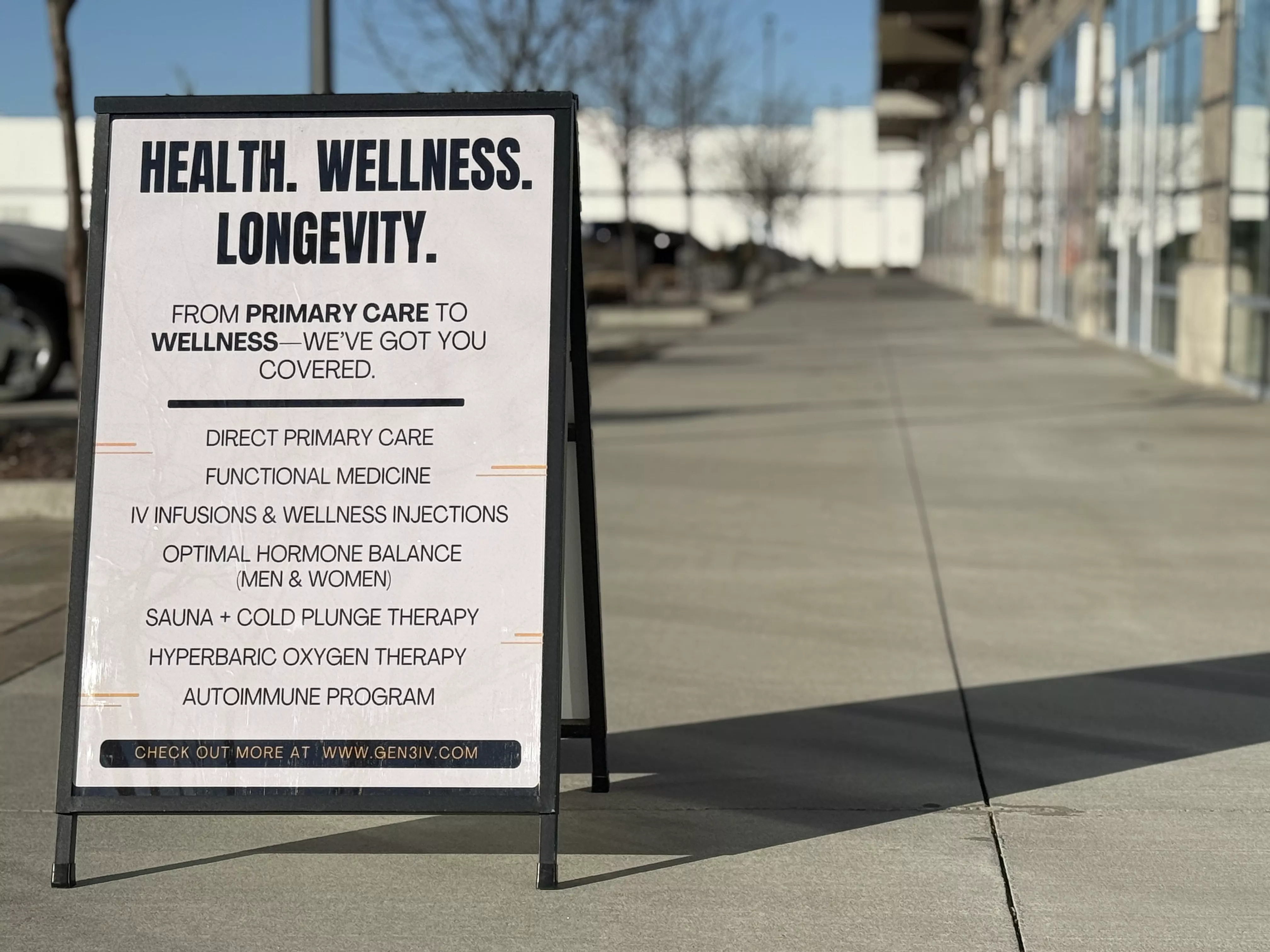 Gen 3 clinic exterior sign listing functional medicine, IV infusions, hormone balance, sauna, cold plunge, hyperbaric oxygen, and autoimmune program